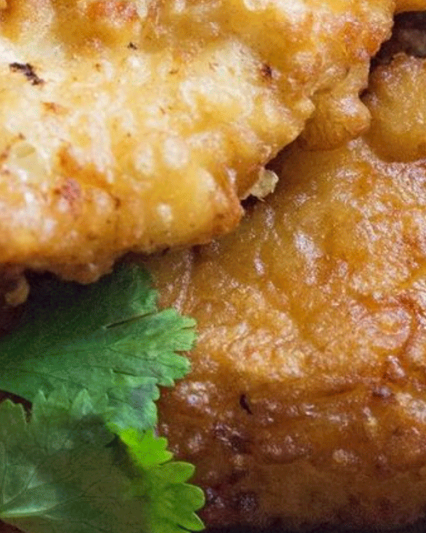 Yorkshire turkey cake on crushed peas 